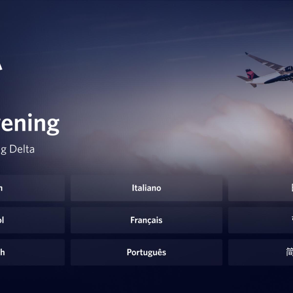 A seatback screen shows a welcome message along with a passenger's seat number and language options.
