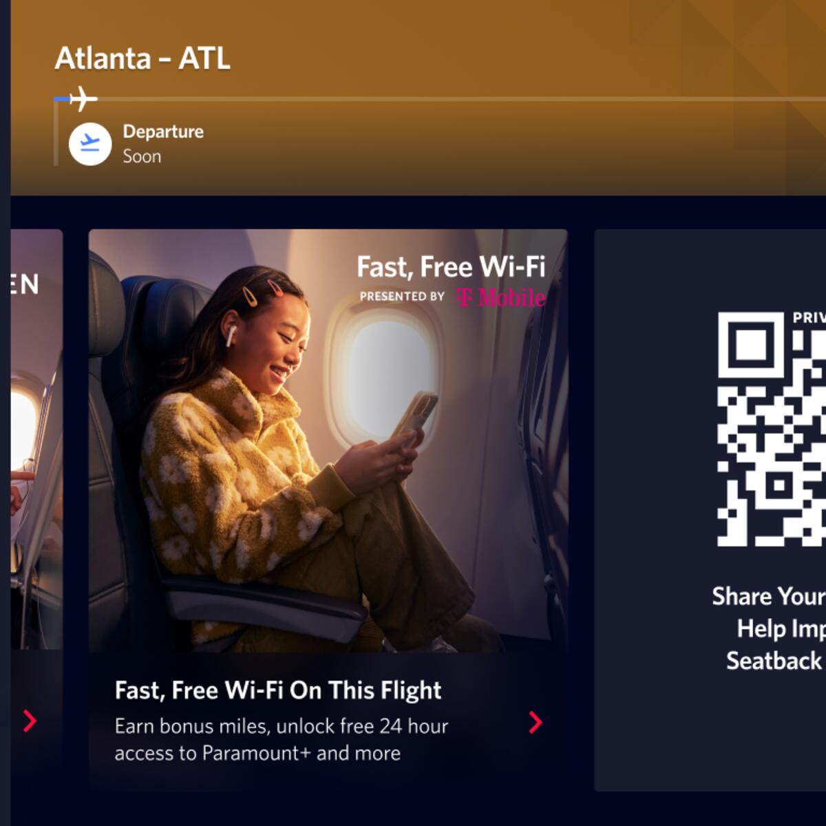 A seatback screen shows a QR code that gives customers the ability to give in-flight customer feedback.