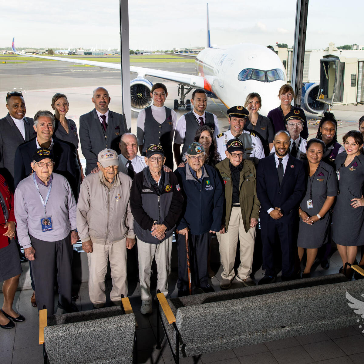 A group photo of the six U.S. veterans and Delta flew to the Netherlands to honor the sacrifices made by their comrades and to reflect on the impact of their efforts on liberating Europe, along with Delta employees who were involved.