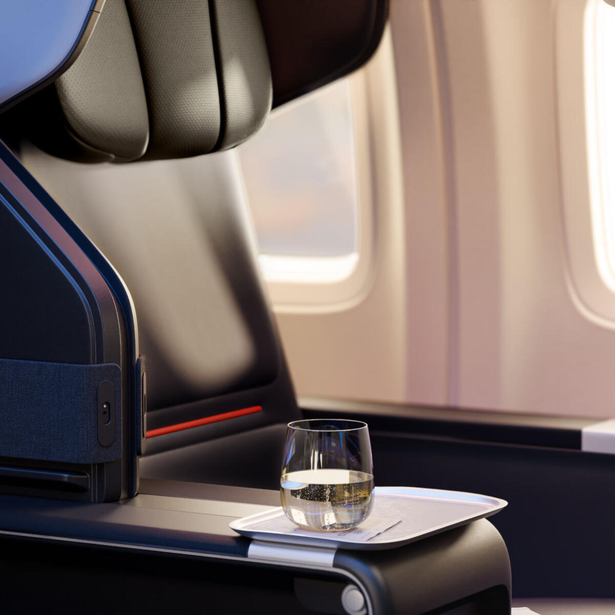 Updated seating for Delta Premium Select and First Class includes a new seat cover over memory foam cushions, complete with breathable engineered leather. 