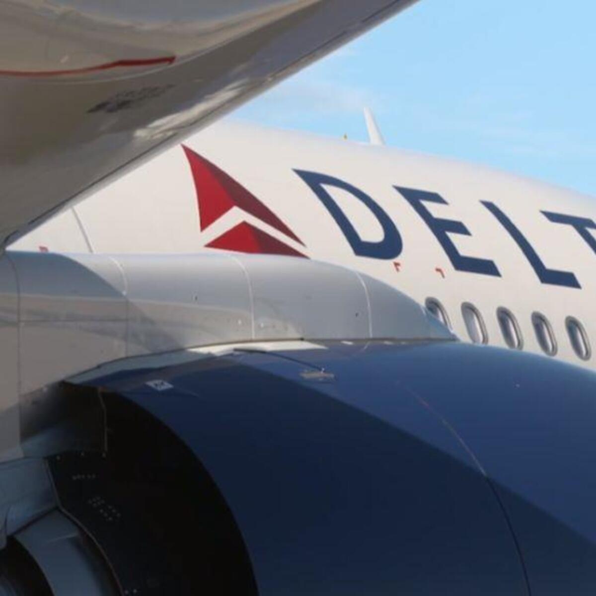 Side view of Delta A330-900 aircraft displaying Delta logo.