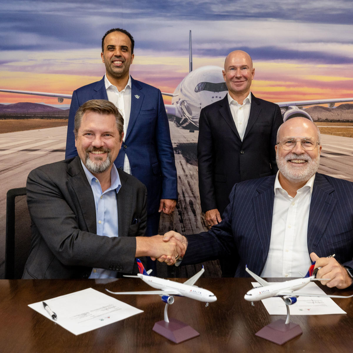 Delta and Saudia leaders during the signing ceremony for their strategic partnership. Back row, from left to right: Ibrahim Al-Omar, Director General (Saudia Group); Alain Bellemare, E.V.P. and President - International (Delta). Front row, from left to right: Arved Von Zur Muehlen, Chief Commercial Officer (Saudia); Perry Cantarutti, S.V.P. - Alliances & International (Delta).