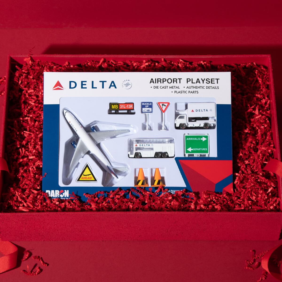 This 10-piece Delta airport playset is the perfect gift for the little aviation enthusiast in your life. Set includes an authentically detailed plane and a variety of vehicles and signs.  