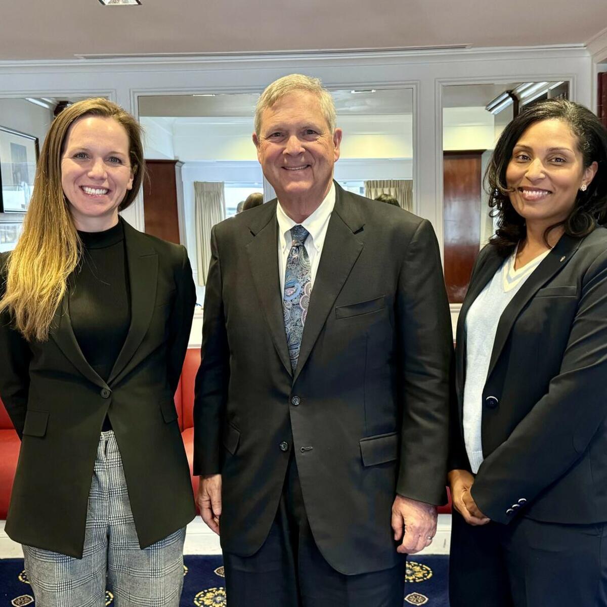 Delta CSO Amelia DeLuca and Cherie Wilson, V.P. Government Affairs - Sustainability with U.S. Department of Agriculture Secretary Rom Vilsack. 