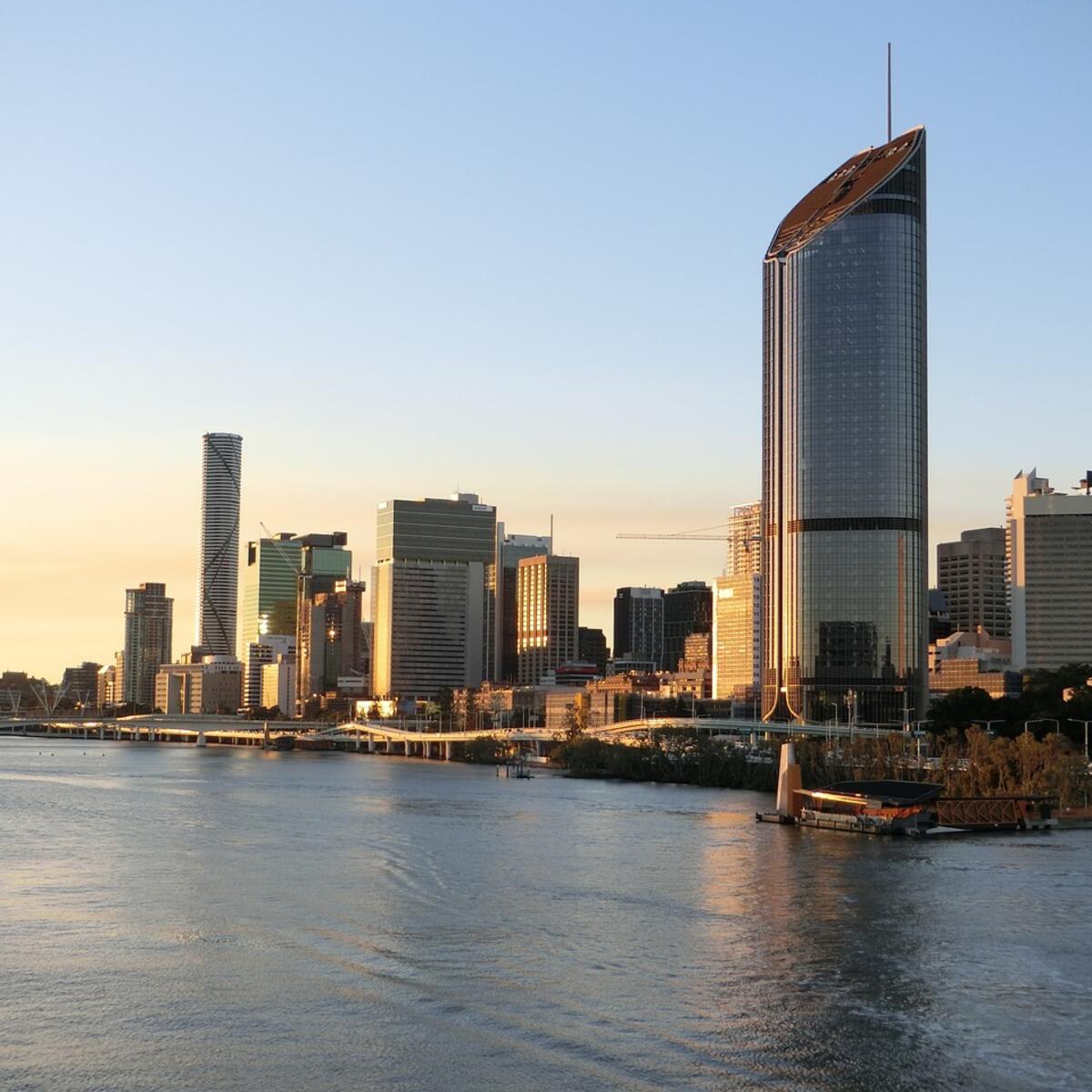 Aerial photo of skyscrapers overlooking a body of water in Brisbane, Australia