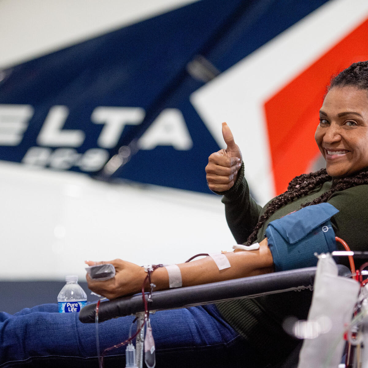 Delta employee giving blood