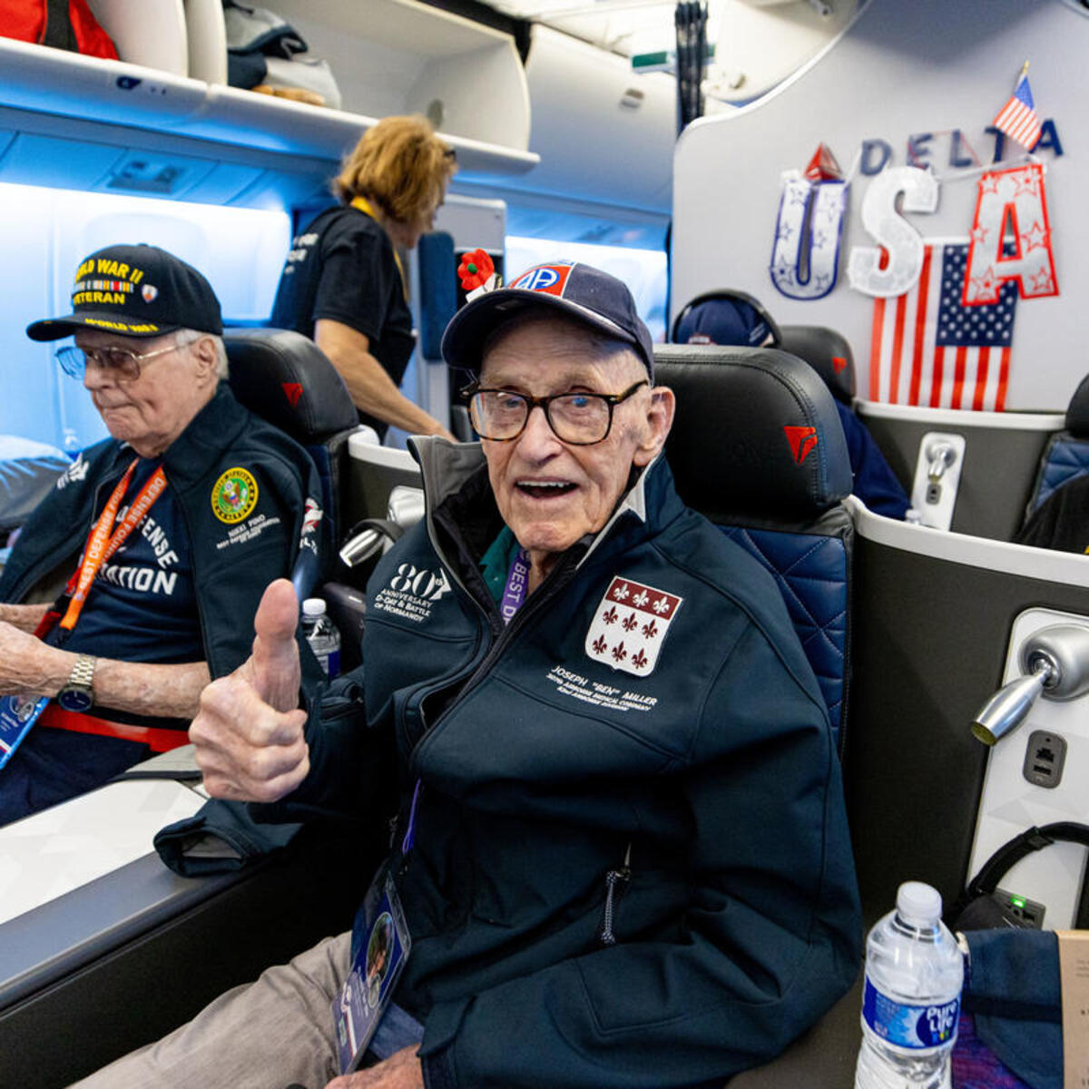 World War II veterans on board Delta's 2024 charter flight to Normandy.
