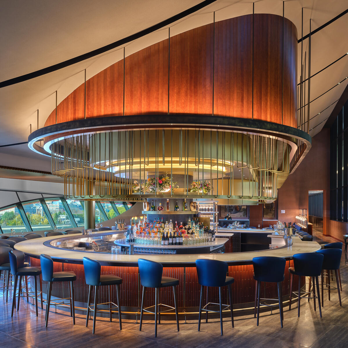 Similar to the adjacent BOS-E Sky Club, the look and feel of the Delta One Lounge pays homage to Boston’s maritime heritage, with standout features like a custom-designed sail ceiling. 