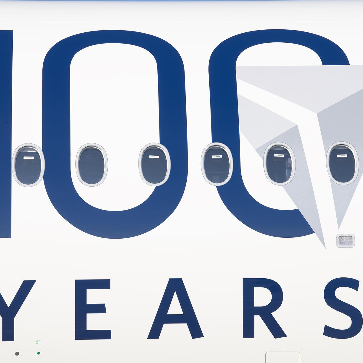 Delta's Centennial livery features a bold 100 emblem.