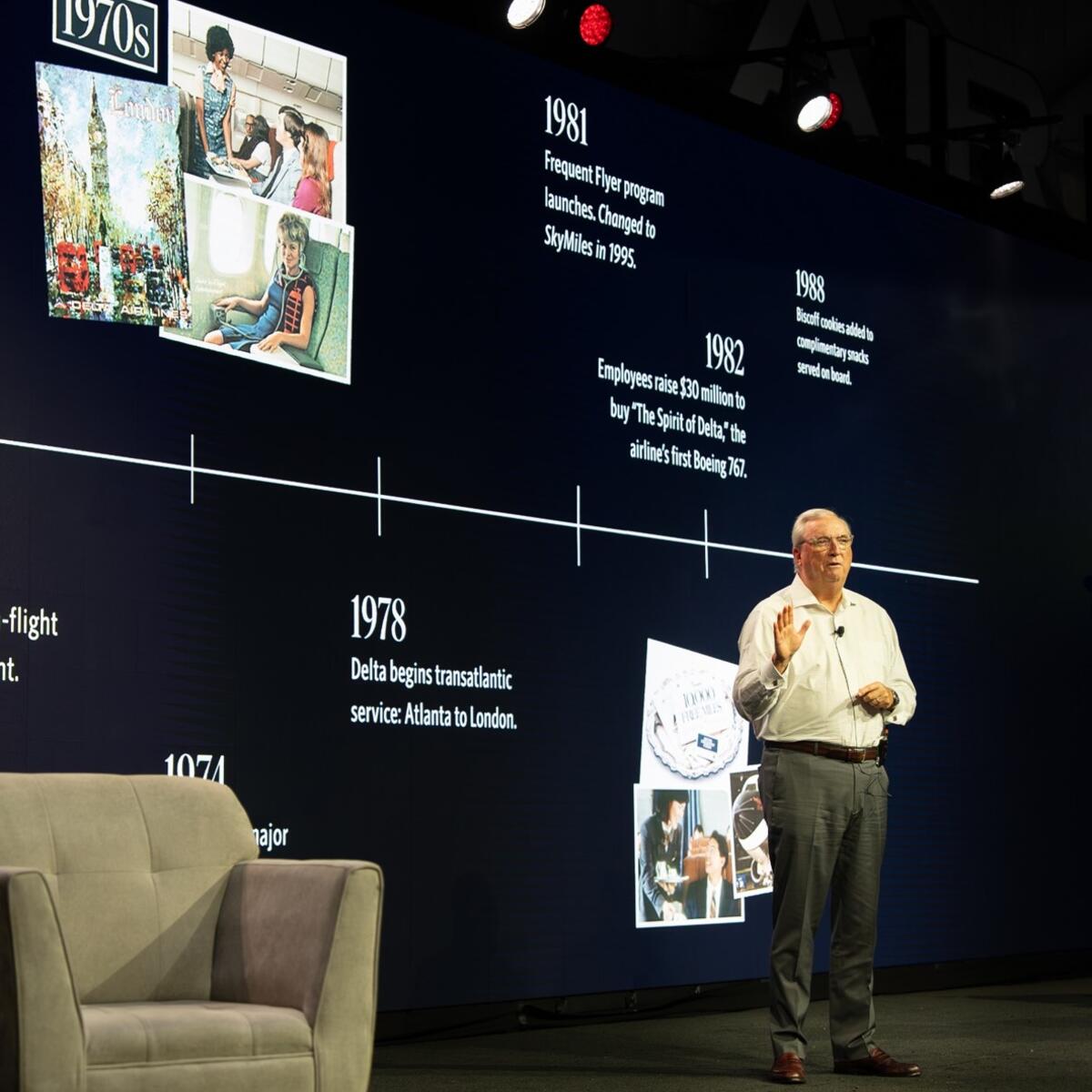 Man giving presentation on stage