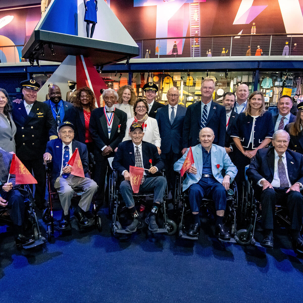 Group shot including six WWII veterans at Virginie Durr's French Legion of Honor ceremony.