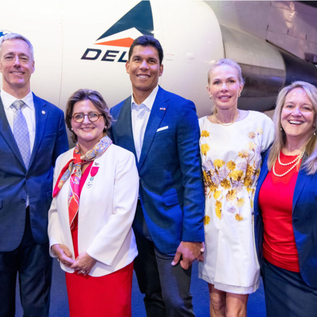 Virginie Durr with partners that support Delta's Normandy Legacy Flight.