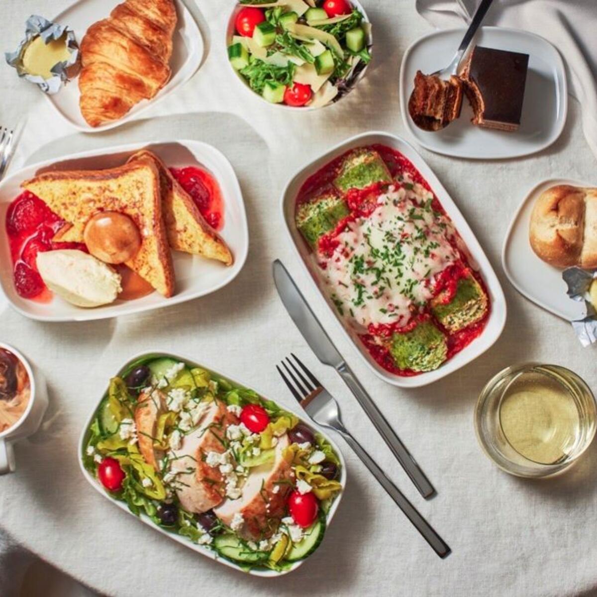 A spread of food featured on Delta flights for Delta One and Premium Select customers