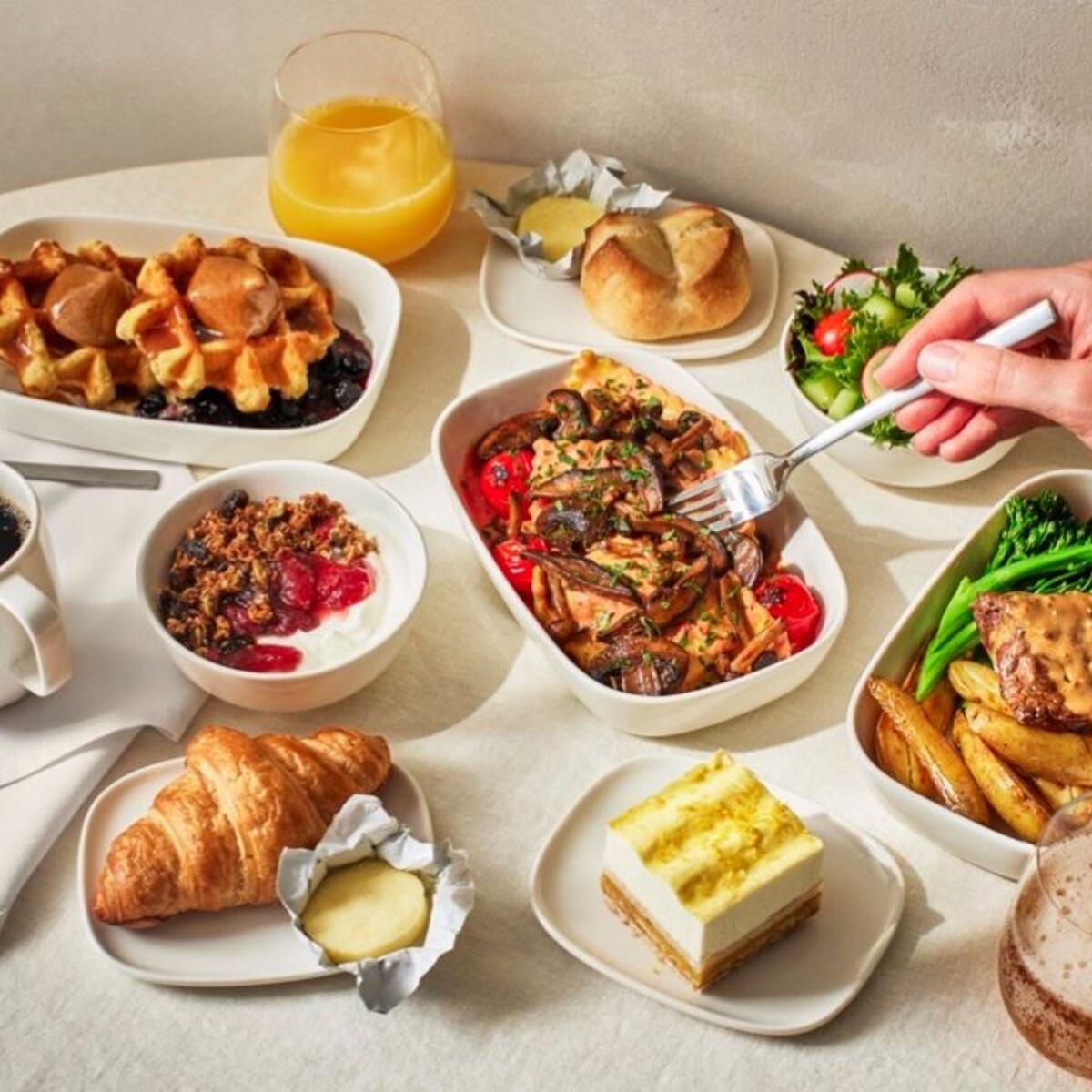 A spread of food featured on Delta flights for Delta One and Premium Select customers