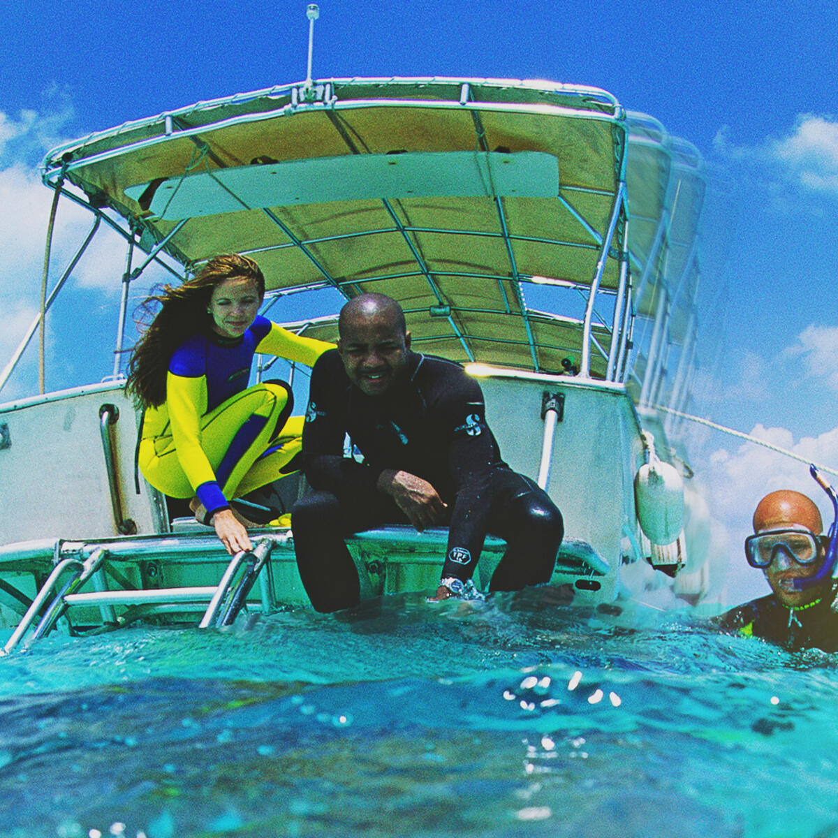 Scuba divers are shown off the coast of Bora-Bora.