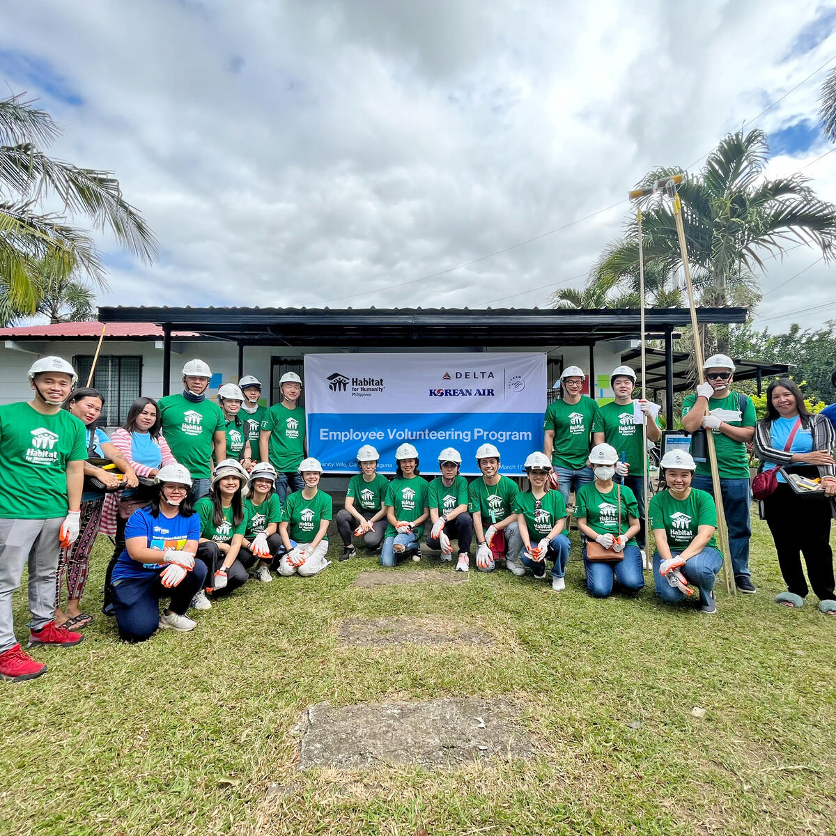 Group of Delta employees gathered at Habitat for Humanity project