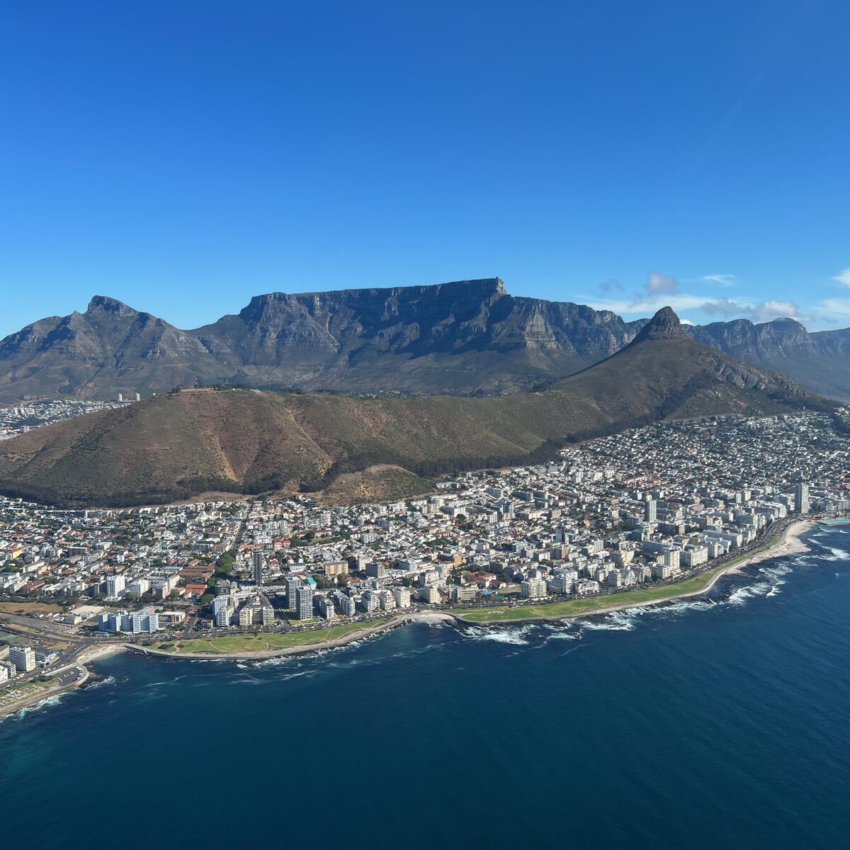 Cape Town, South Africa is located on the country’s southwest coast, bordering the sea beneath the dominant Table Mountain.