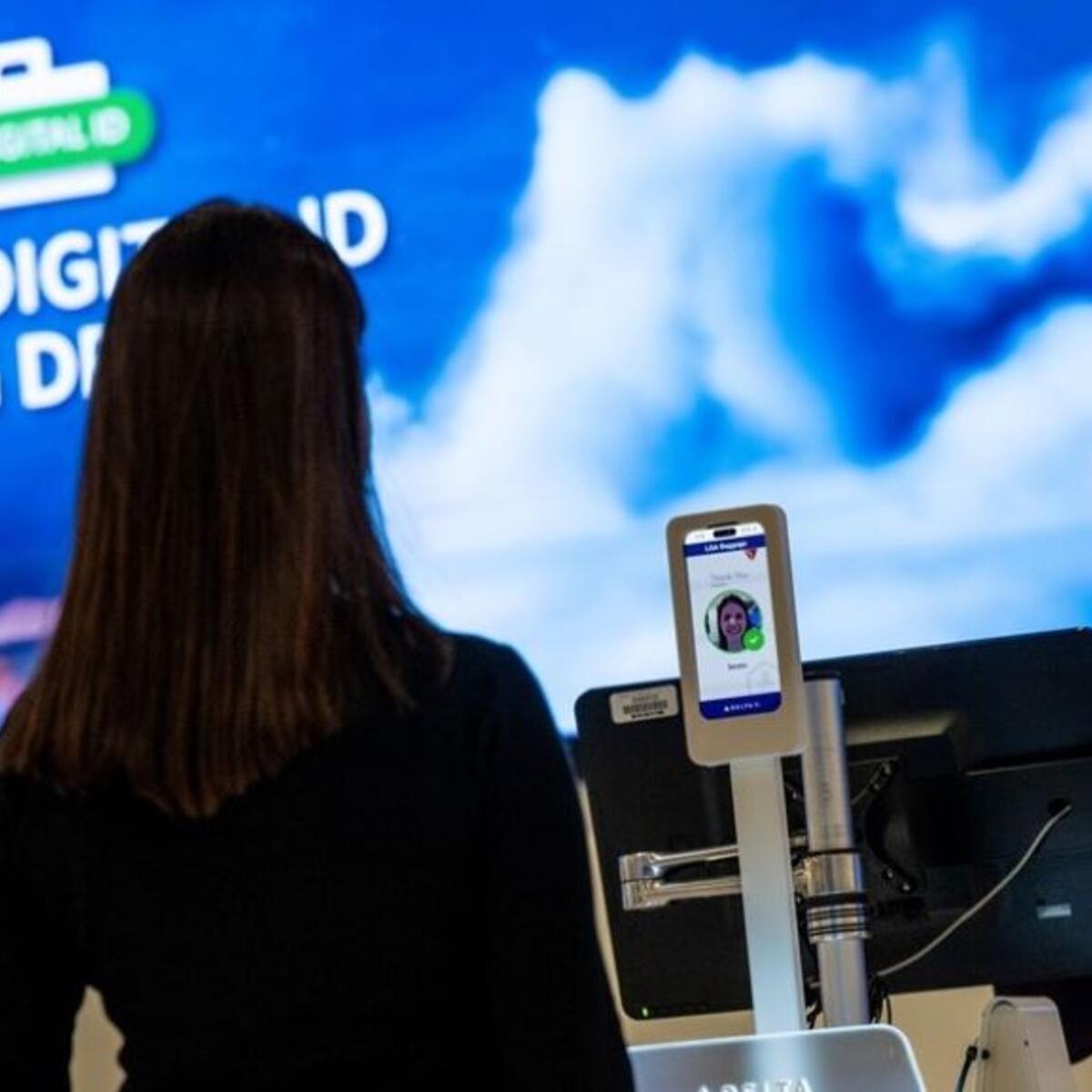 A customer uses Delta's Digital ID feature at the airport.
