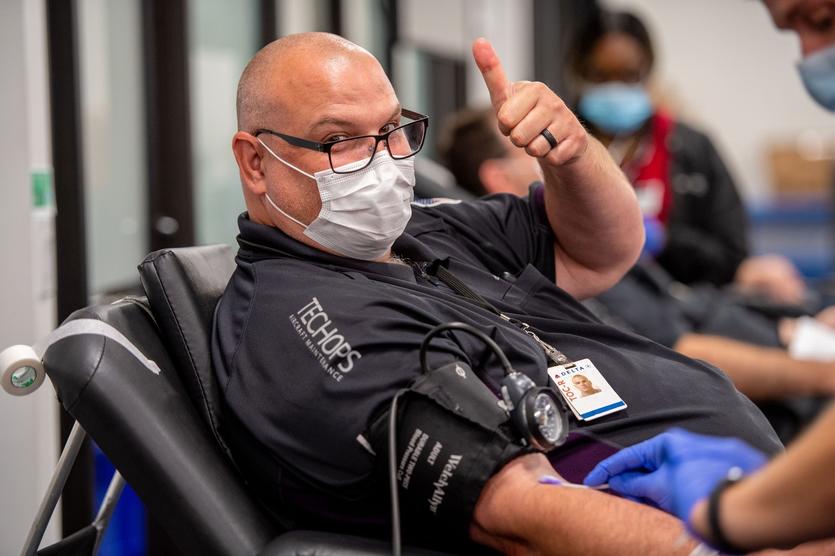 Delta employee gives blood