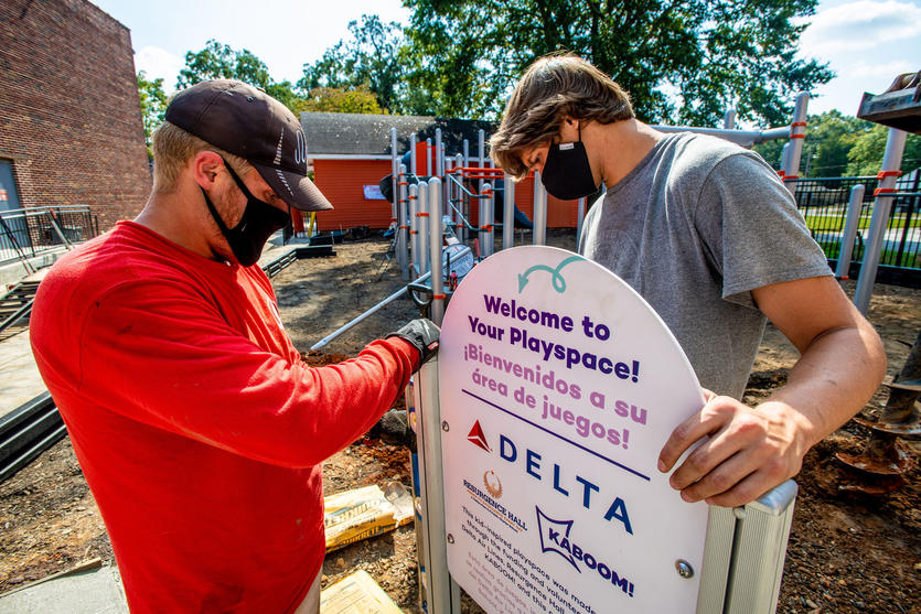Delta employees helping build playground