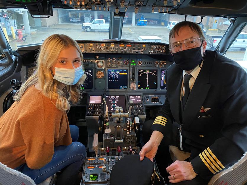 Mollie and Captain Leveille in the flight deck