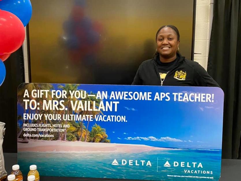 Melissa Vaillant was surprised Friday with the gift of a summer vacation from Delta Air Lines and Delta Vacations.