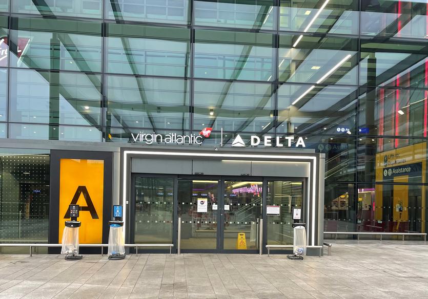 Entrance to Terminal 3 at Heathrow Airport with Virgin Atlantic and Delta logos