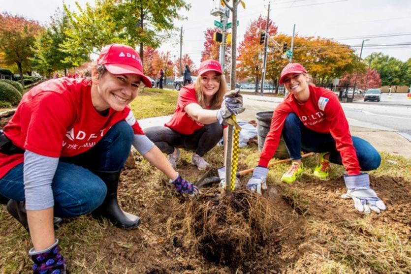 Delta volunteers planting trees