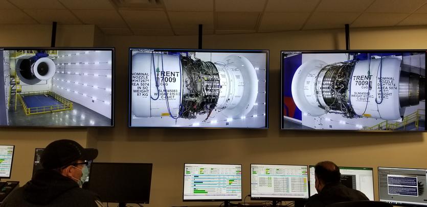 Monitors of a Rolls-Royce Trent 7009 engine test with TechOps employees