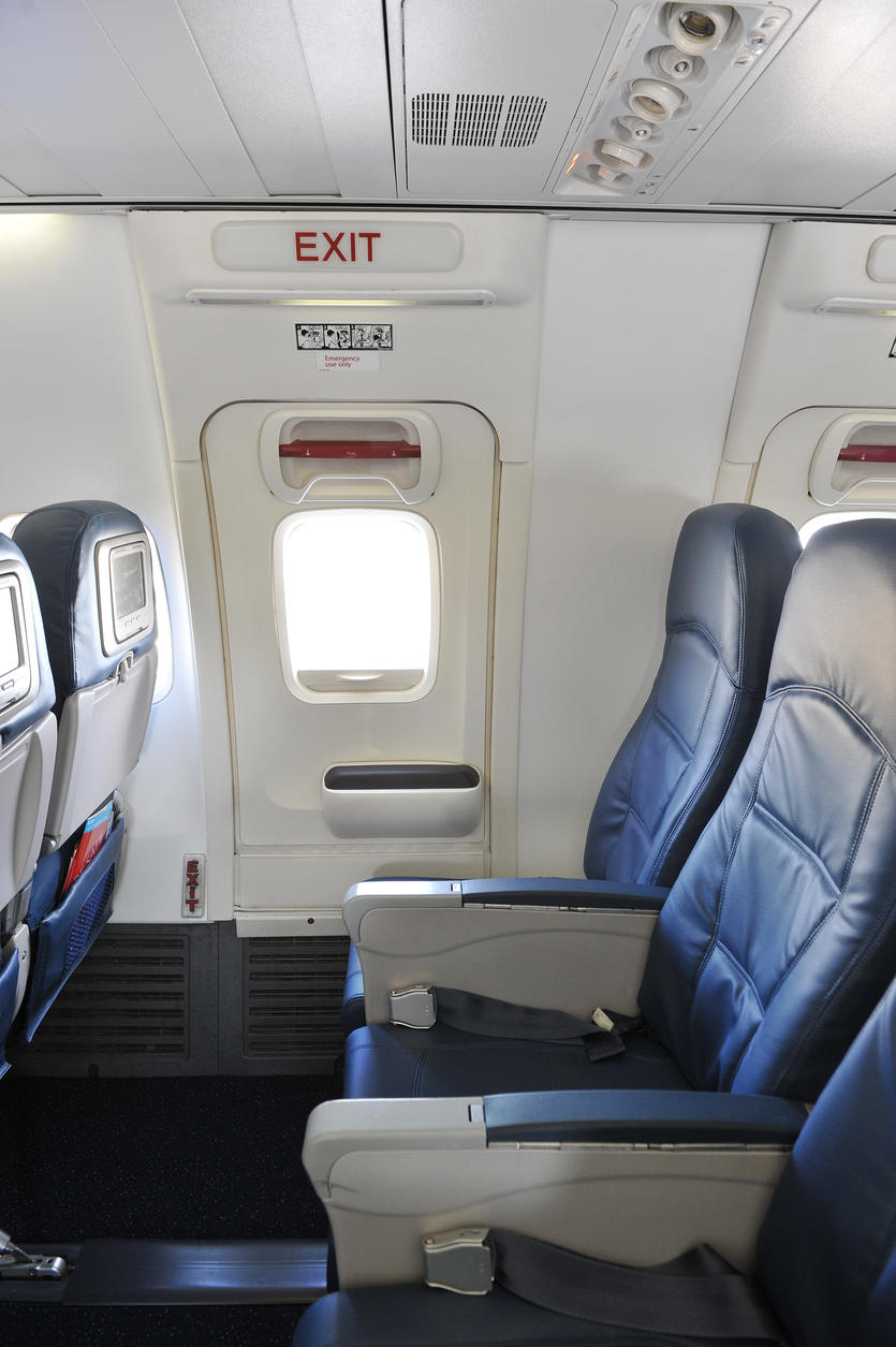 A 737-800 interior seating and emergency window view