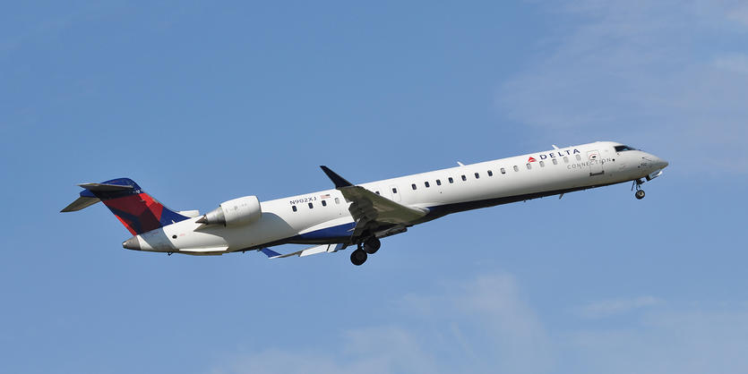 The Bombardier CRJ-900, operated by Delta Connection Carrier Endeavor Air or SkyWest Airlines, takes off.