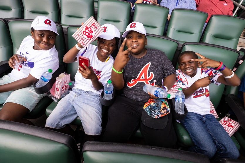 Four children at Atlanta Braves game