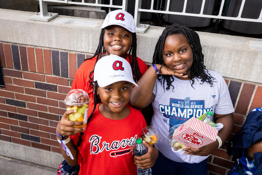 Three children at Atlanta Braves game