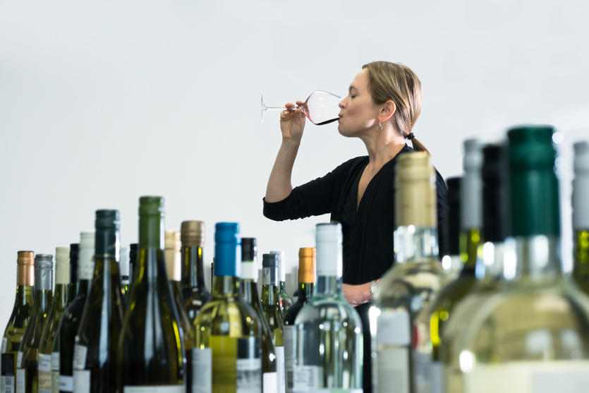 Woman sampling glass of wine