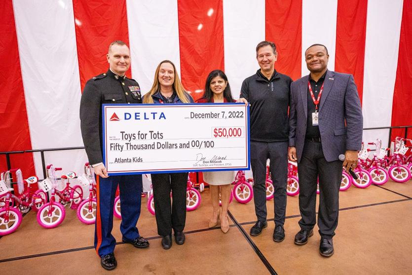 Delta people from TechOps, In-Flight Service, Global Sales, Finance, IT and Flight Operations rallied to purchase and assemble bicycles, as well as rally toy and money donations to support Toys for Tots.