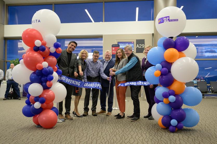 Officials participate in a ribbon-cutting ceremony at SLC on May 16, 2023. Delta’s growth continues at Salt Lake City International Airport with the opening of five additional gates this week, following the initial launch of a new 900,000-square-foot Concourse A in Sept. 2020.
