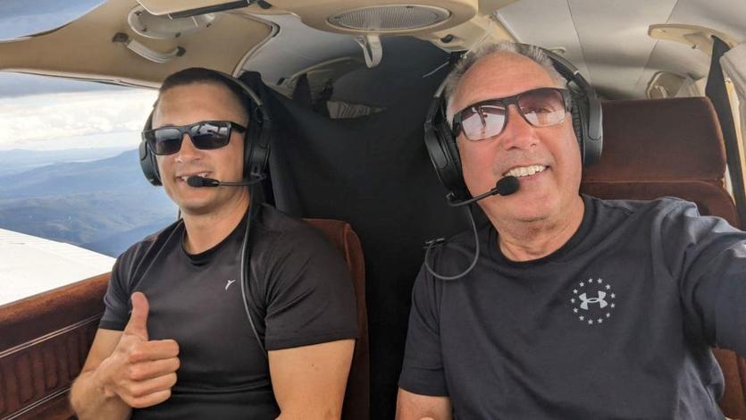 Delta pilots Barry Behnfeldt and Aaron Wilson sit in the cockpit of a six-seat 1980 PA32R Piper Saratoga.