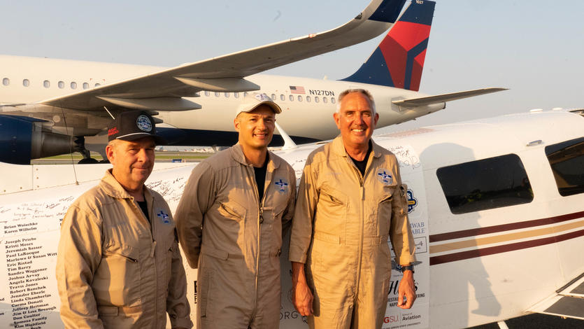 Pilots Barry Behnfeldt and Aaron Wilson, along with maintenance technician Thomas Twiddy make a stop at Hartsfield-Jackson Atlanta International Airport (ATL) during their 48N48 mission -- an attempt to land in all 48 of the contiguous states within 48 hours. They were greeted by Delta Chief of Operations John Laughter.