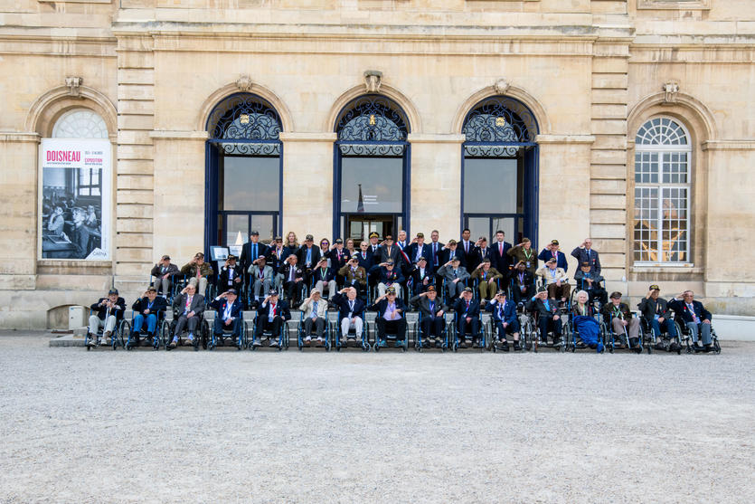 WWII veterans give a salute at our farewell dinner hosted by the mayor of Caen at the Abbaye aux Homes, Caen city hall.