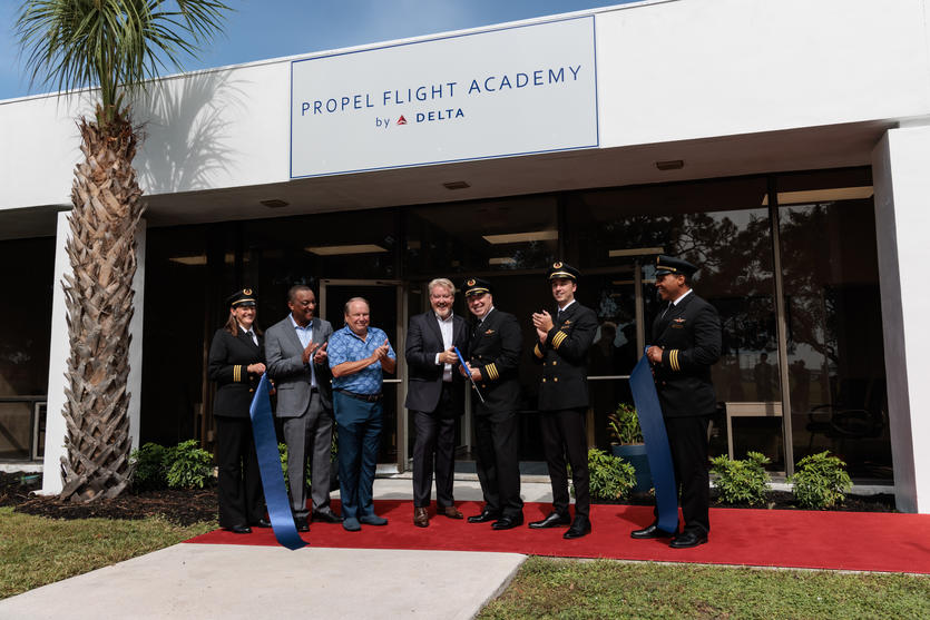 A ribbon cutting at the event to celebrate the official opening of Delta's Propel Flight Academy.
