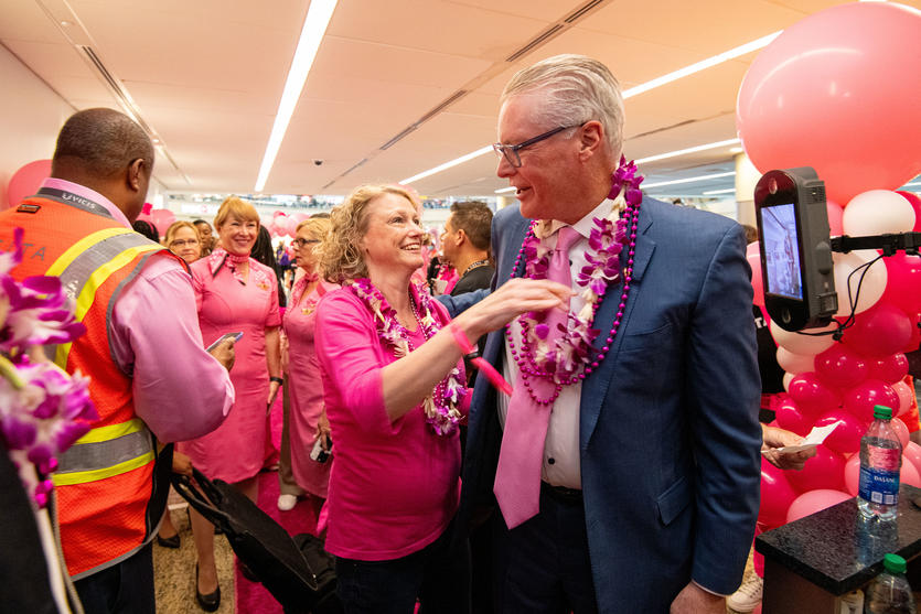 Ed Bastian joins the breast cancer survivors during the preflight celebration for the Breast Cancer One charter flight.