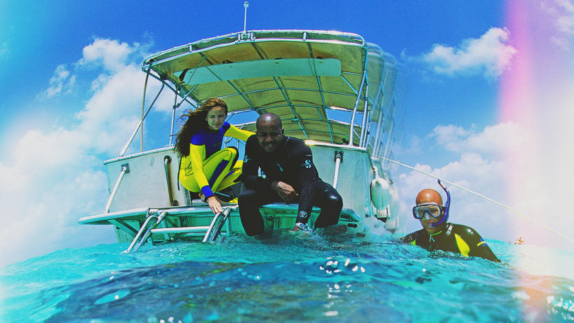 Scuba divers are shown off the coast of Bora-Bora.