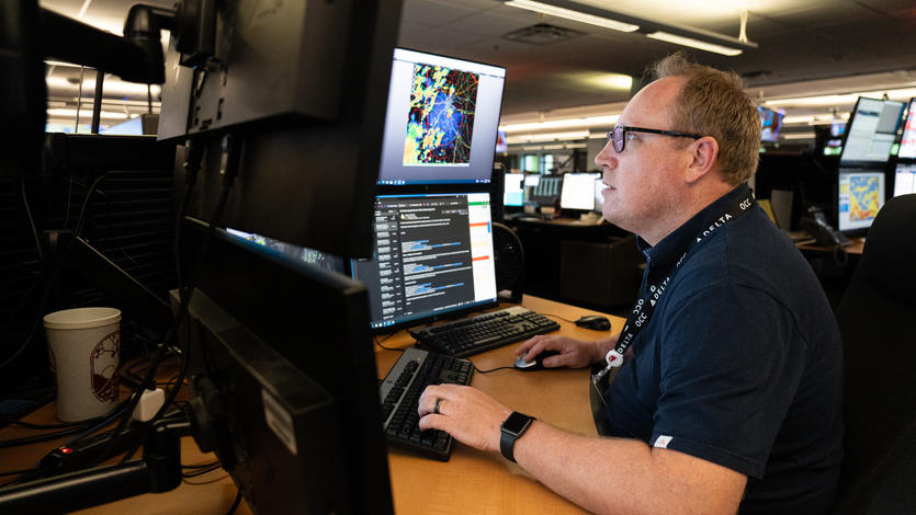 Warren Weston, a member of Delta's in-house meteorology team, working inside the Operations and Customer Center in Atlanta.