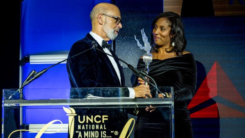 Cherie Wilson, V.P. of Government Affairs at Delta accepted the UNCF Keeper of the Flame award from Milton Jones, Chairman of UNCF, and Dr. Michael Lomax, UNCF’s President and CEO.