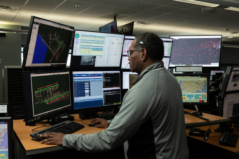 Delta manager viewing multiple screen at Delta Operations Control Center