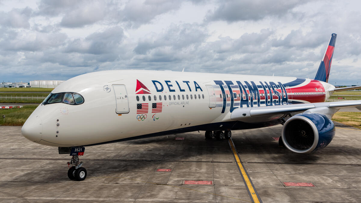 Employee honorees celebrate the reveal of new Team USA aircraft in Toulouse France Delta News Hub