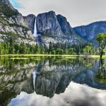 Mountains reflected in the water at Yosemite Valley in Yosemite National Park, California 