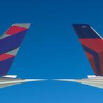 Tails from Delta and LATAM aircraft