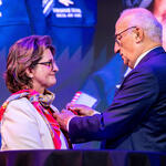 Ambassador of France Philippe Étienne presents French Legion of Honor to Virginie Durr.