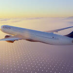 A Delta jet flies above a cloud layer at sunset, with a faint digital grid pattern overlaid across the sky.